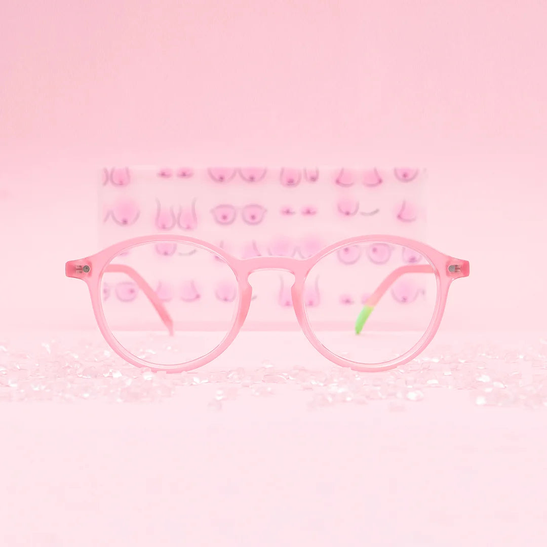 Photograph of a frame from the 'La Vue En Rose' collection, Light Blue Light. In the foreground, the frame is accompanied by plastic granules, while in the background, there is an illustration depicting various busts.